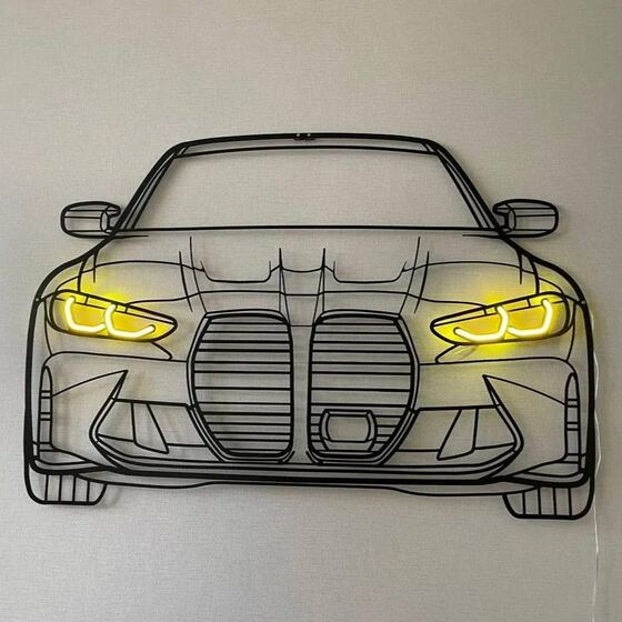 Металеве панно у формі автомобіля BMW з жовтою LED-підсвіткою фар на світлій стіні
